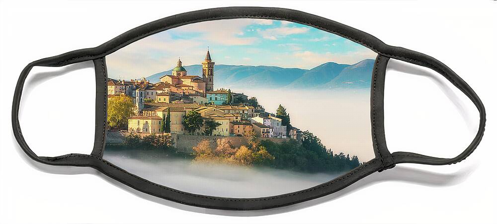 Trevi Face Mask featuring the photograph Trevi picturesque village in a foggy morning. Perugia, Umbria, I by Stefano Orazzini