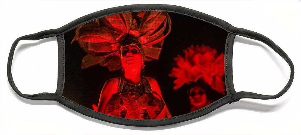 #soscuba Face Mask featuring the mixed media A Cuban beauty dances and sings at the 1970 Havana Carnival. Red on a black background. by Elena Gantchikova