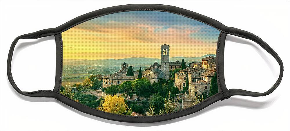 Assisi Face Mask featuring the photograph Assisi town at sunset. by Stefano Orazzini