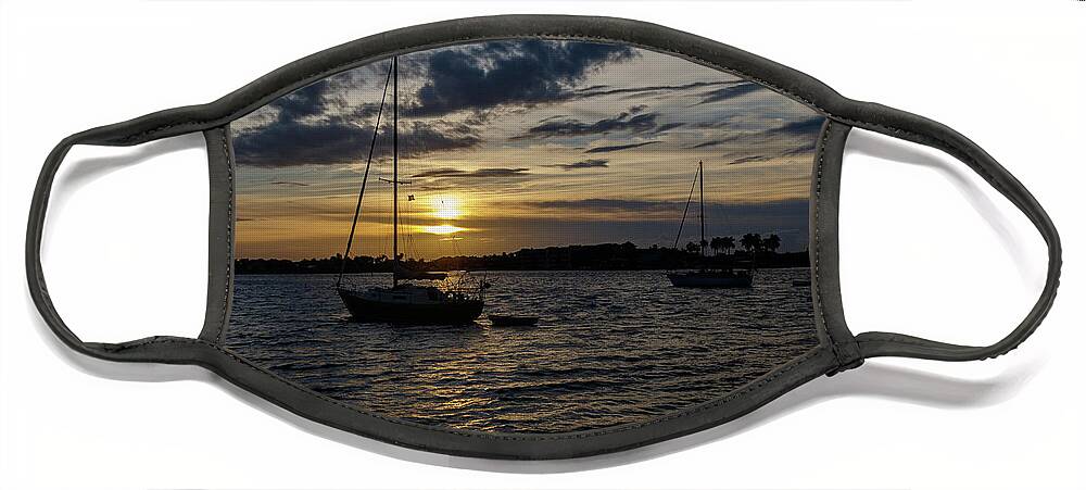 Water Face Mask featuring the photograph Boating Sunset by Les Greenwood