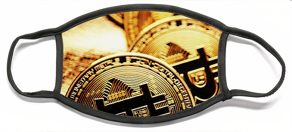 Bitcoin Face Mask featuring the photograph Closeup of golden bitcoin over gold background by Jelena Jovanovic
