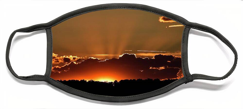 Crepuscular Face Mask featuring the photograph Crepuscular rays at sunset by Monika Salvan