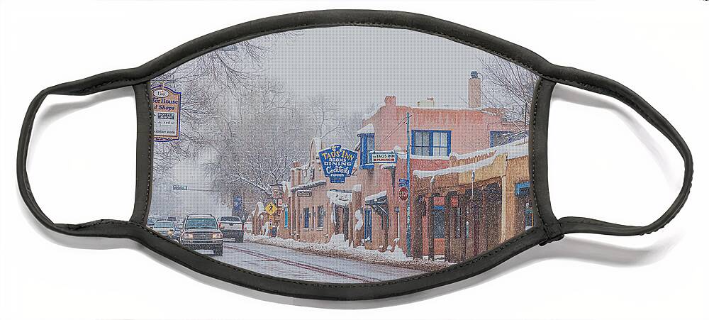 Taos Face Mask featuring the photograph Downtown Taos while snowing by Elijah Rael