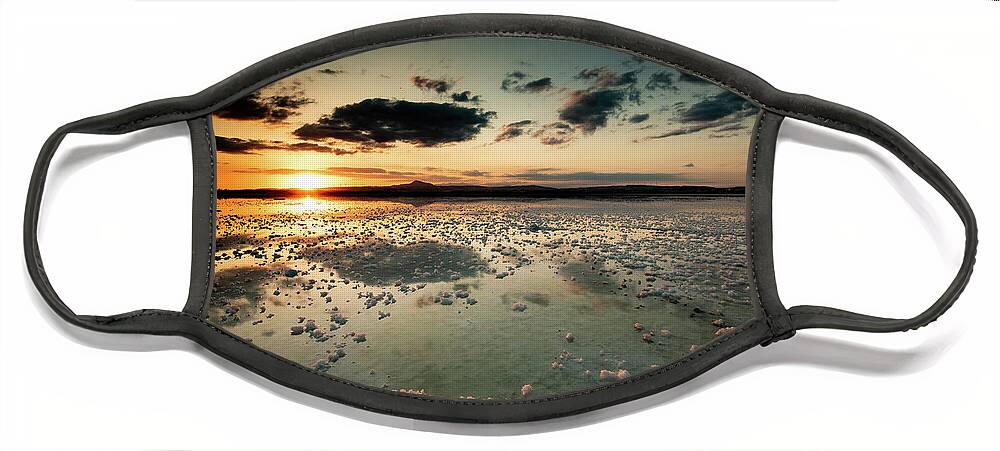 Sunset Face Mask featuring the photograph Dramatic winter sunset in the lake. by Michalakis Ppalis