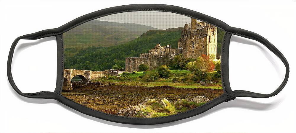Scotland Face Mask featuring the photograph Eilean Donan Castle in the loch Alsh at the highlands of Scotlan by Michalakis Ppalis