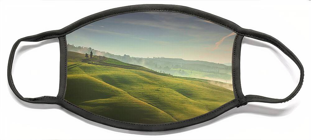 Tuscany Face Mask featuring the photograph Foggy morning in Tuscany, rolling hills and trees. by Stefano Orazzini