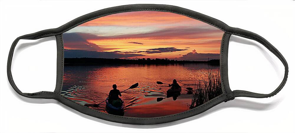 Kayaks At Beautiful Nimisila Reservoir In The City Of Green Face Mask featuring the photograph Kayaks at Red Sunset by Mary Walchuck