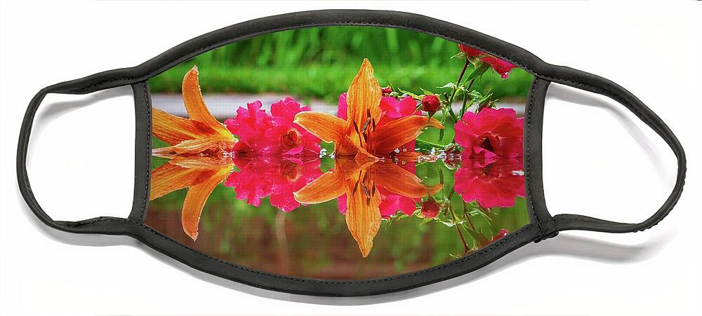 Orange Face Mask featuring the photograph Lilies and Roses Reflection by Jason Fink