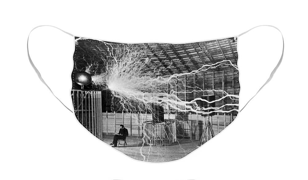 Nikola Tesla Face Mask featuring the photograph Nikola Tesla - Bolts Of Electricity by War Is Hell Store