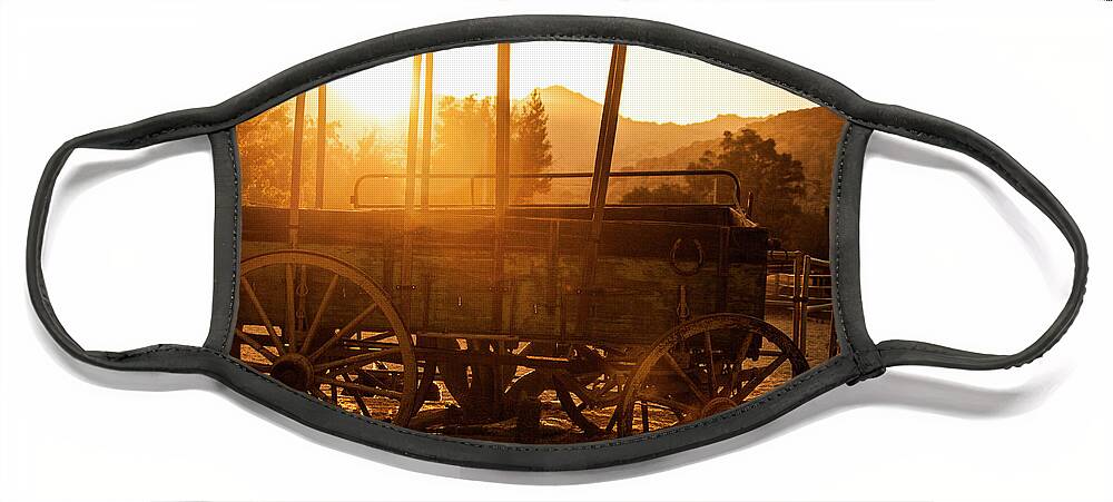 Sunset Wagon Wheel Face Mask featuring the photograph Old West Covered Wagon by Jerry Cowart