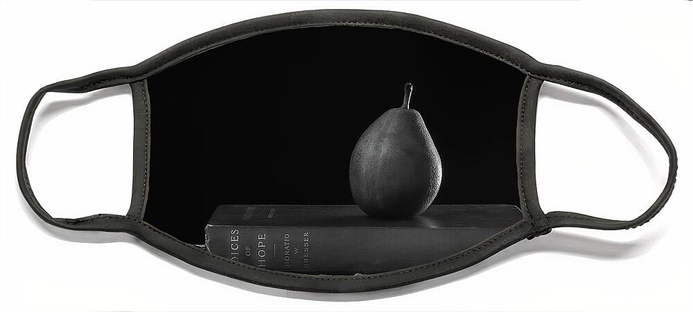Pear Face Mask featuring the photograph Pear on Books by Sylvia Goldkranz