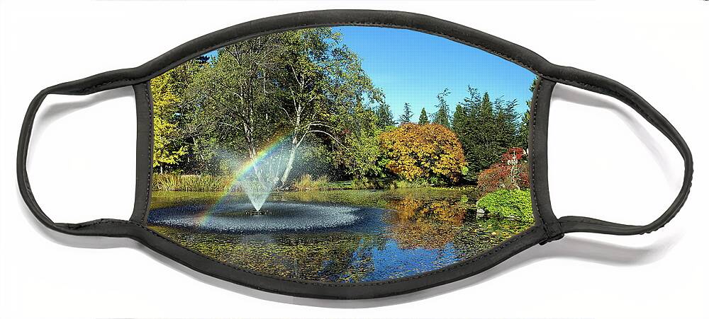 Alex Lyubar Face Mask featuring the photograph Rainbow in the fountain by Alex Lyubar