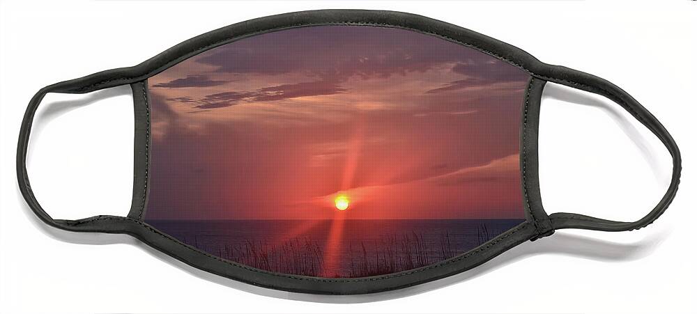 Sunrise Face Mask featuring the photograph Rising From The Sea by Lois Bryan