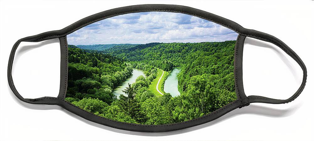 Two Face Mask featuring the photograph River and path in a valley. by Bernhard Schaffer