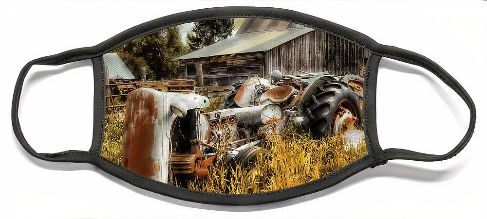 1950 Ferguson Rusty Tractor Photography Face Mask featuring the photograph Rusty Tractor by Jerry Cowart