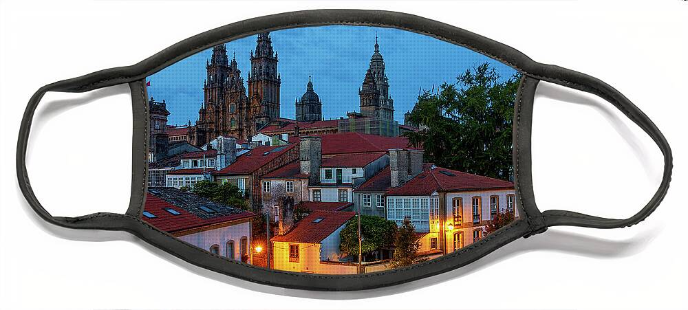 Way Face Mask featuring the photograph Santiago de Compostela Cathedral Spectacular View by Night Dusk with Street Lights and Tiled Roofs La Corua Galicia by Pablo Avanzini