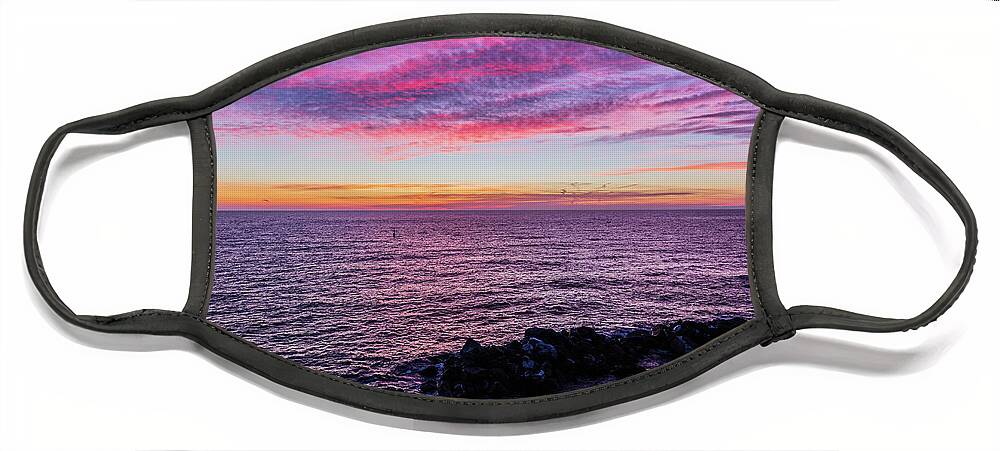 Sea Face Mask featuring the photograph Seascape at sunset by Fabiano Di Paolo