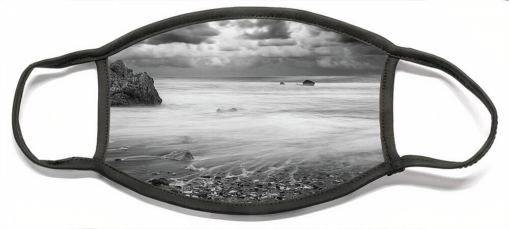 Seascape Face Mask featuring the photograph Seascape with windy waves during stormy weather. by Michalakis Ppalis