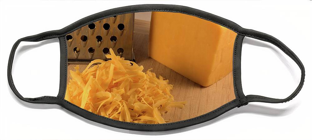 Cheese Face Mask featuring the photograph Shredded Cheddar by Kae Cheatham