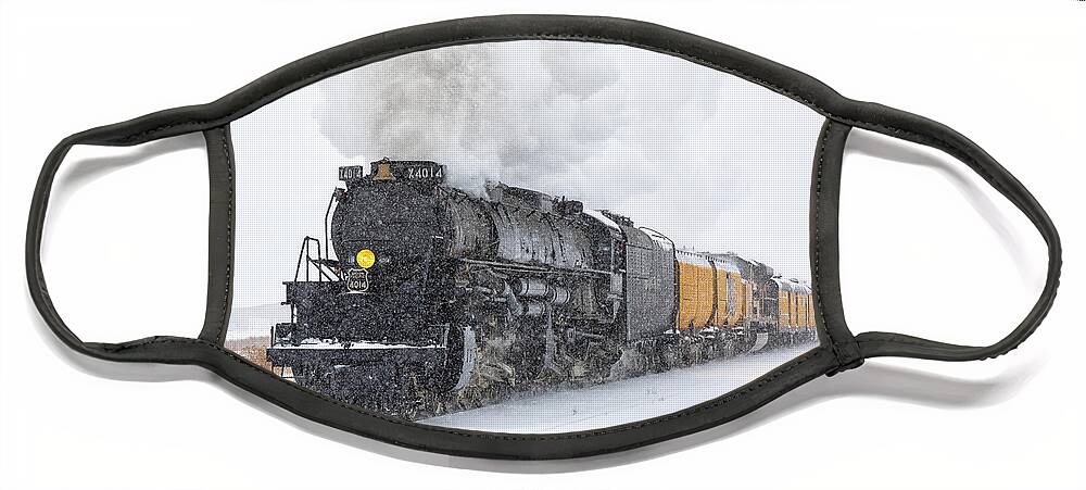 Train Face Mask featuring the photograph Steam Engine Races Through a Snowstorm by Tony Hake