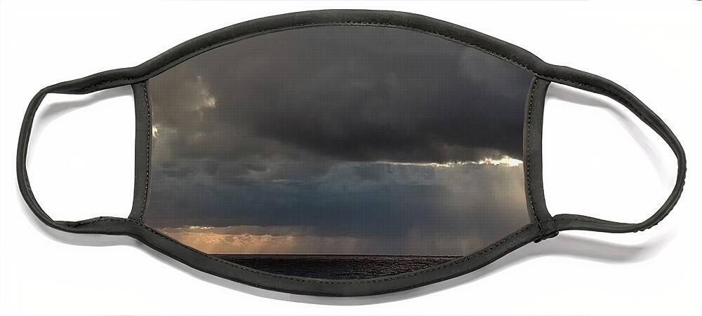 Nature Face Mask featuring the photograph Sun Through Storm Clouds by Jerry Sodorff