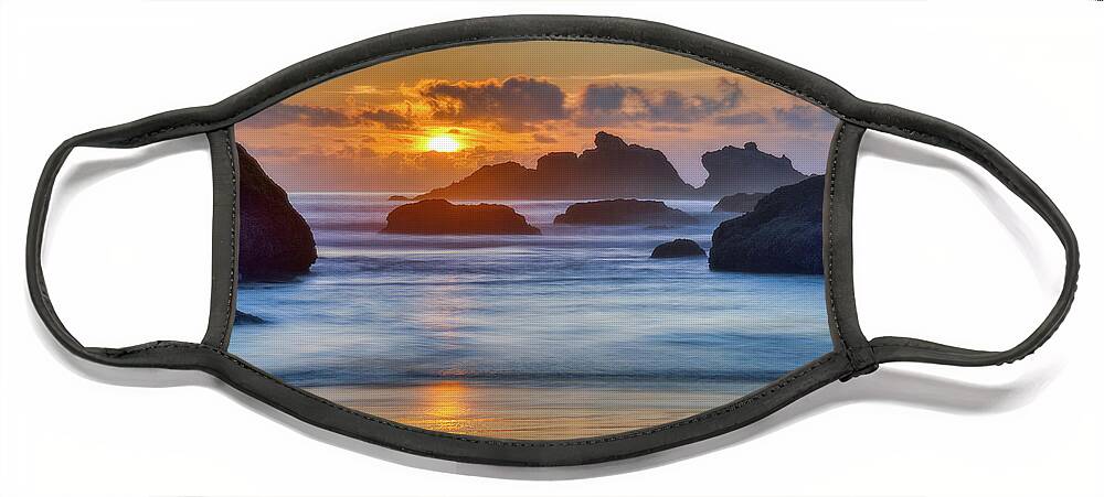 Bandon Beach Face Mask featuring the photograph Sunset over sea stacks by Izet Kapetanovic