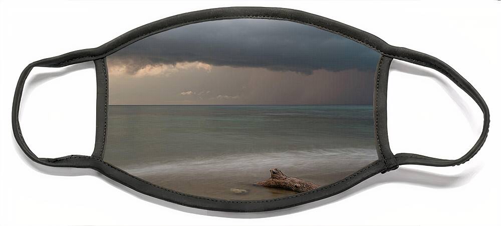 Storm Face Mask featuring the photograph The coming of the storm from ocean by Michalakis Ppalis