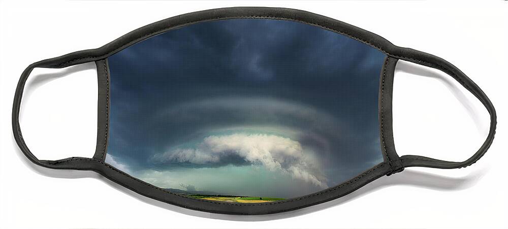 Storm Face Mask featuring the photograph The eye of every storm by Mikel Martinez de Osaba