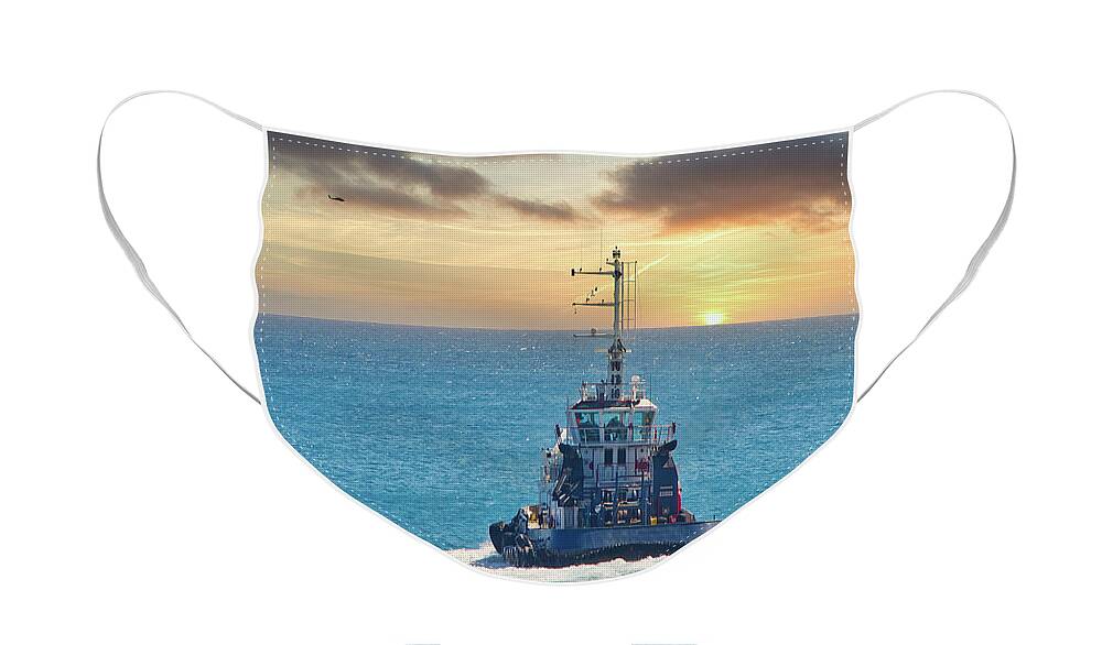Harbor Face Mask featuring the photograph Tugboat Heading into Sunset by Darryl Brooks