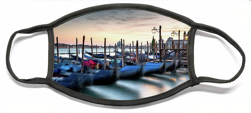 Gondola Face Mask featuring the photograph Venice Gondolas moored at the San Marco square. by Michalakis Ppalis
