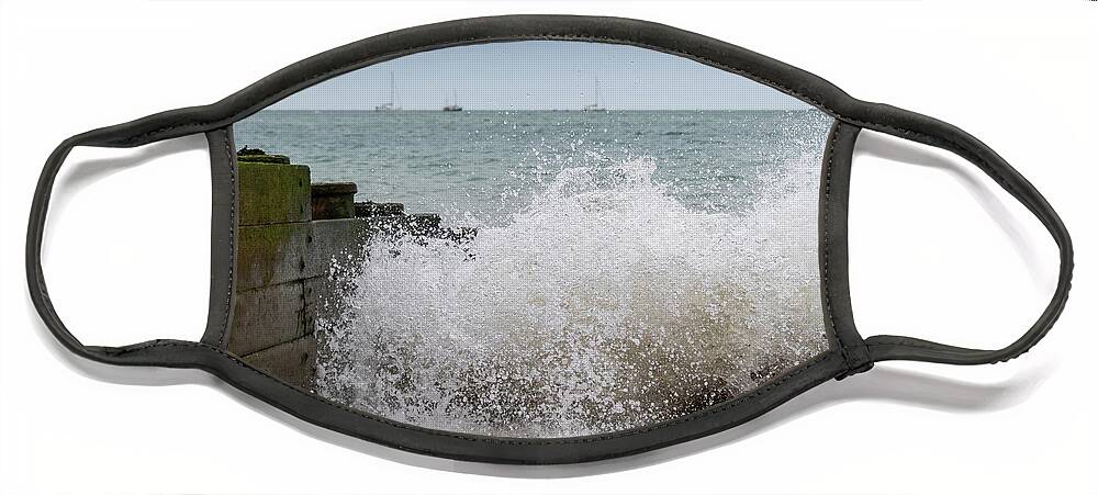 Eastbourne Face Mask featuring the photograph Wave splash by Andrew Lalchan