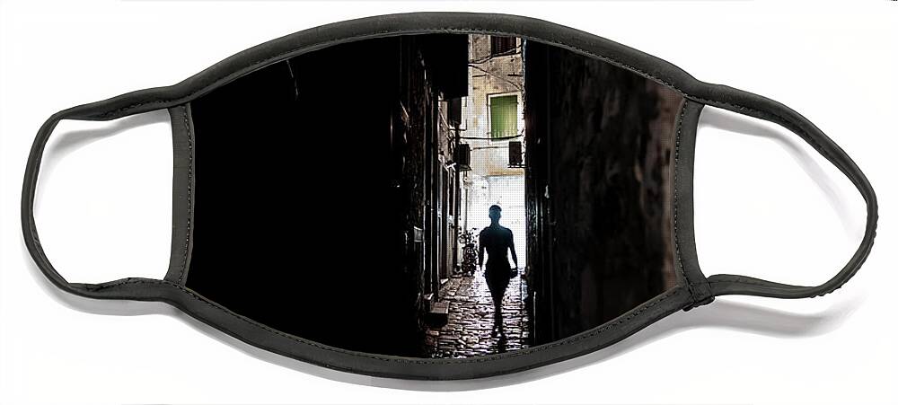 Face Mask featuring the photograph Young Woman Walks Alone Through Spooky Narrow Abandoned Alley In The Night by Andreas Berthold