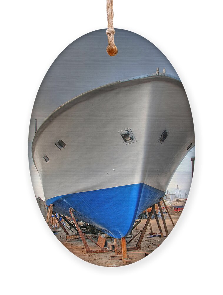 Israel Ornament featuring the photograph a resting boat in Jaffa port by Ron Shoshani