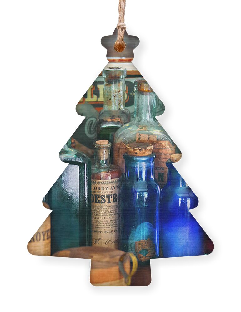 Pharmacy Ornament featuring the photograph Apothecary - Remedies for the Fits by Mike Savad