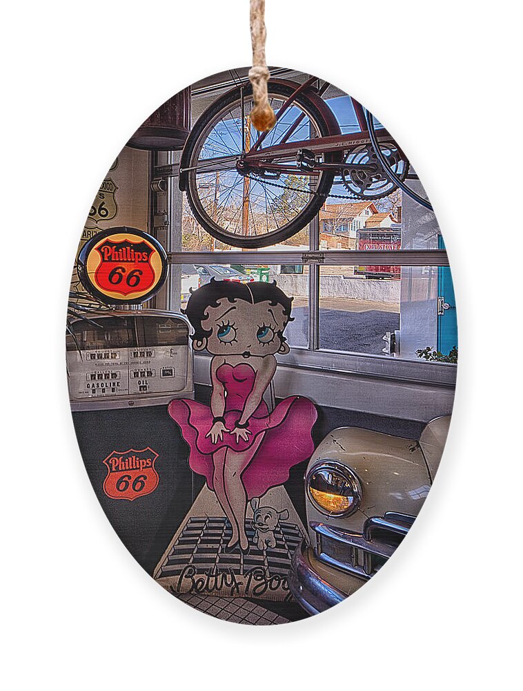 66 Diner Ornament featuring the photograph Betty Boop at Albuquerque's 66 Diner by Priscilla Burgers