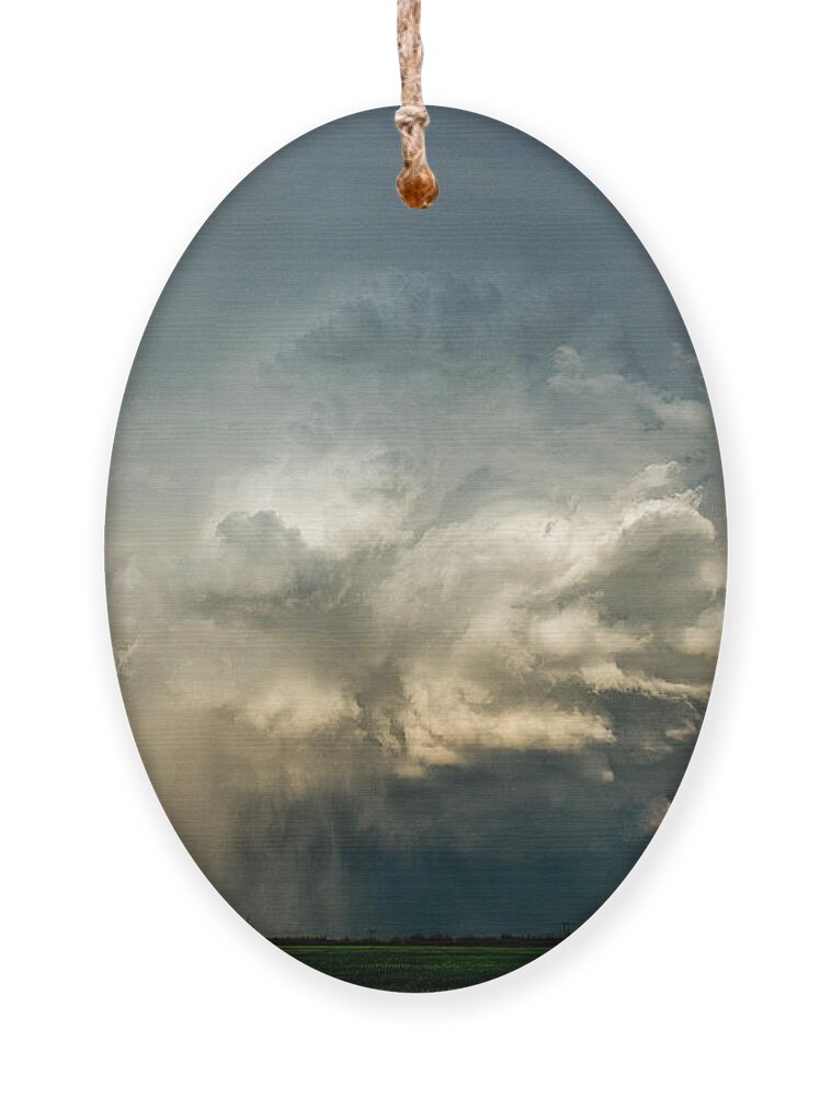 Thunderstorm Ornament featuring the photograph Colorful Ice Machine by Marcus Hustedde
