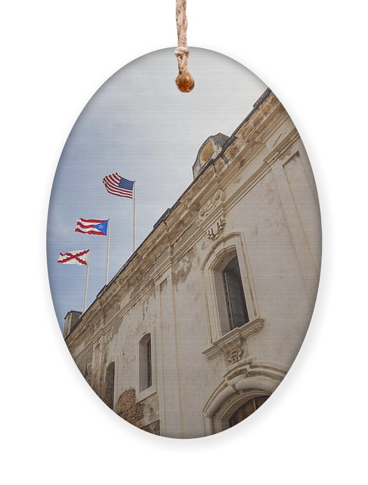 Castillo De San Cristobal Ornament featuring the photograph Flags At Fort San Cristobal by Bryan Mullennix