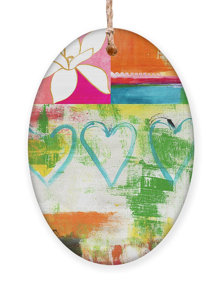 Magnolia Ornament featuring the painting In Bloom- colorful heart and flower art by Linda Woods