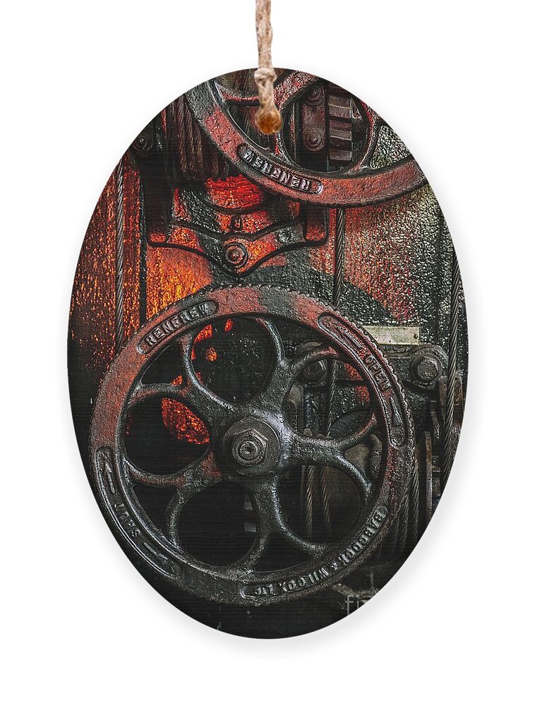 Vintage Ornament featuring the photograph Industrial Wheels by Carlos Caetano