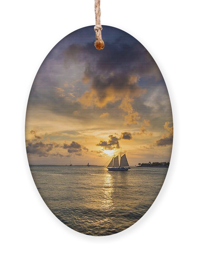 Key Ornament featuring the photograph Key West Florida Sunset and Sailboat Mallory Square by Robert Bellomy