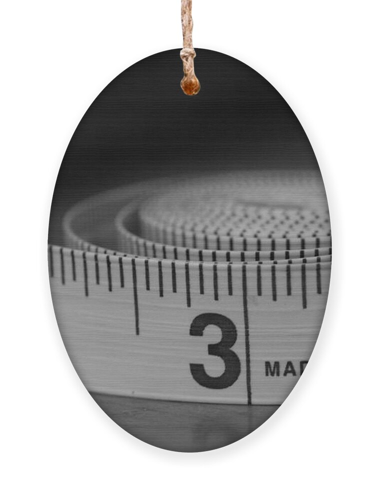 Tape Measure Ornament featuring the photograph Measuring Up by Holden The Moment