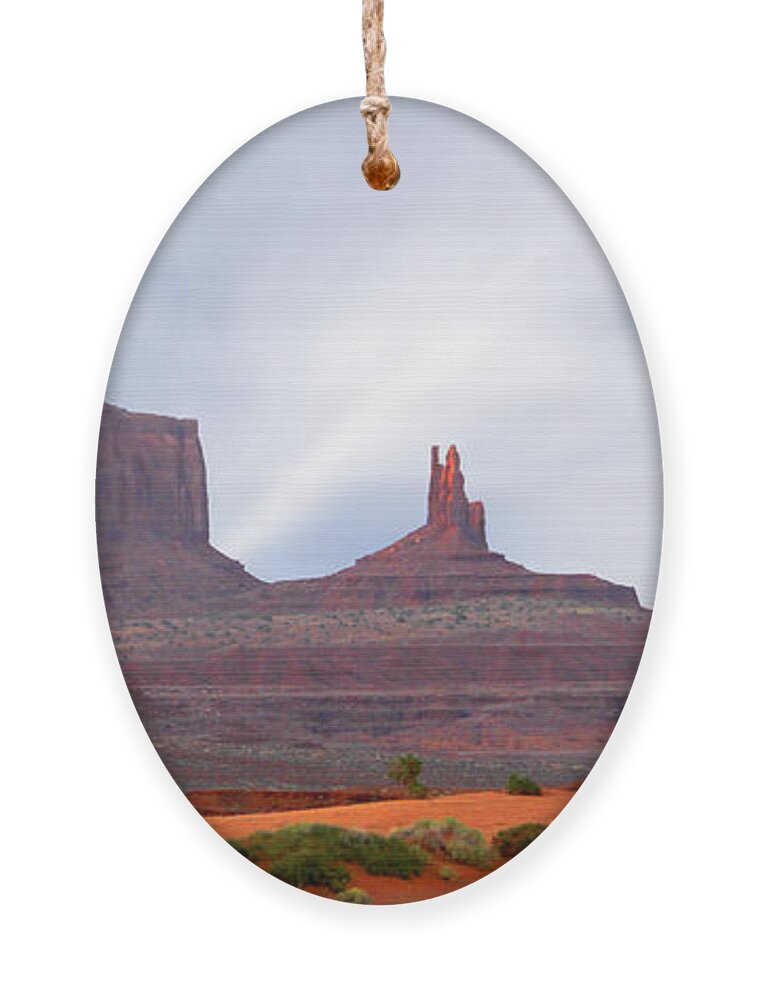 Desert Ornament featuring the photograph Monument Valley at Sunset Panoramic by Mike McGlothlen