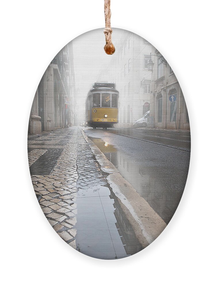 Lisbon Ornament featuring the photograph Out of the haze by Jorge Maia