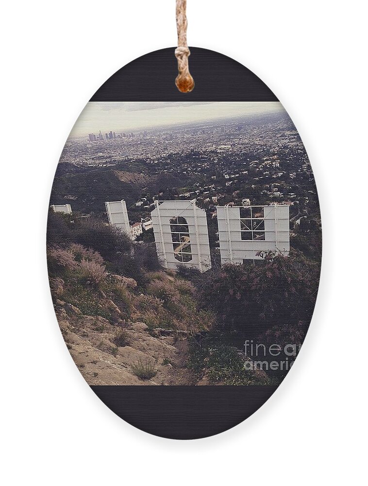 Hollywood Ornament featuring the photograph Peek by Denise Railey