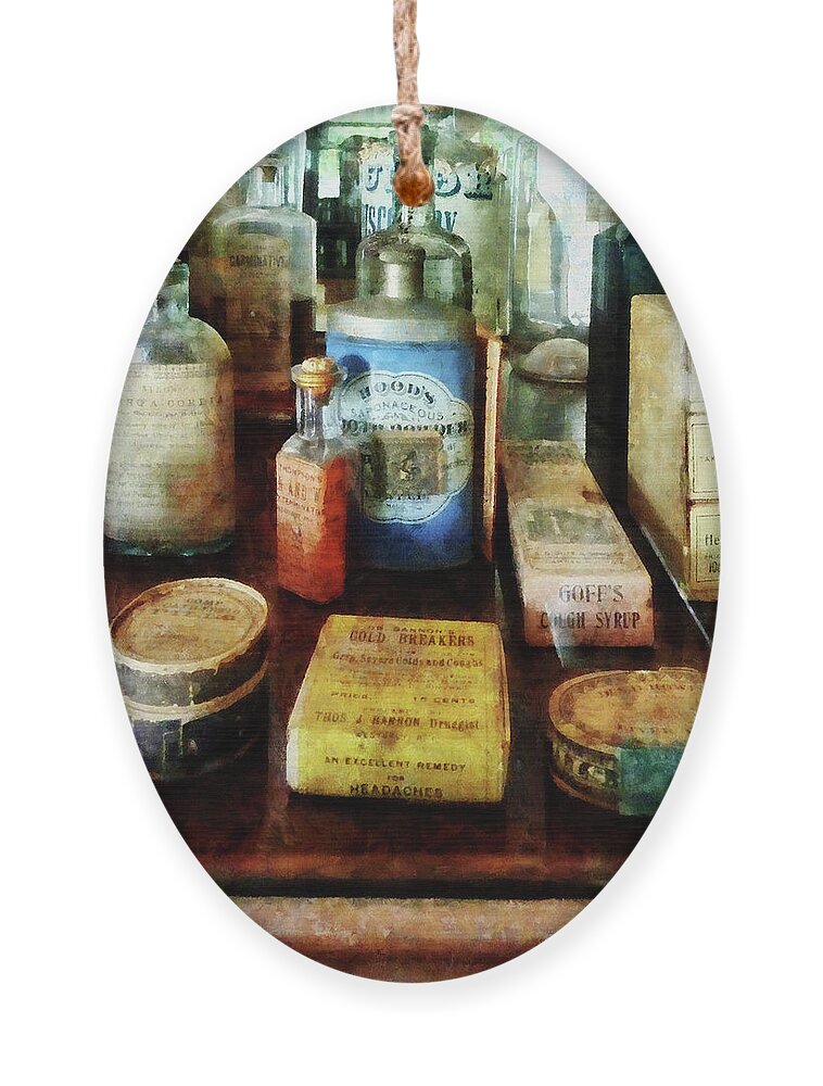 Druggist Ornament featuring the photograph Pharmacy - Cough Remedies and Tooth Powder by Susan Savad