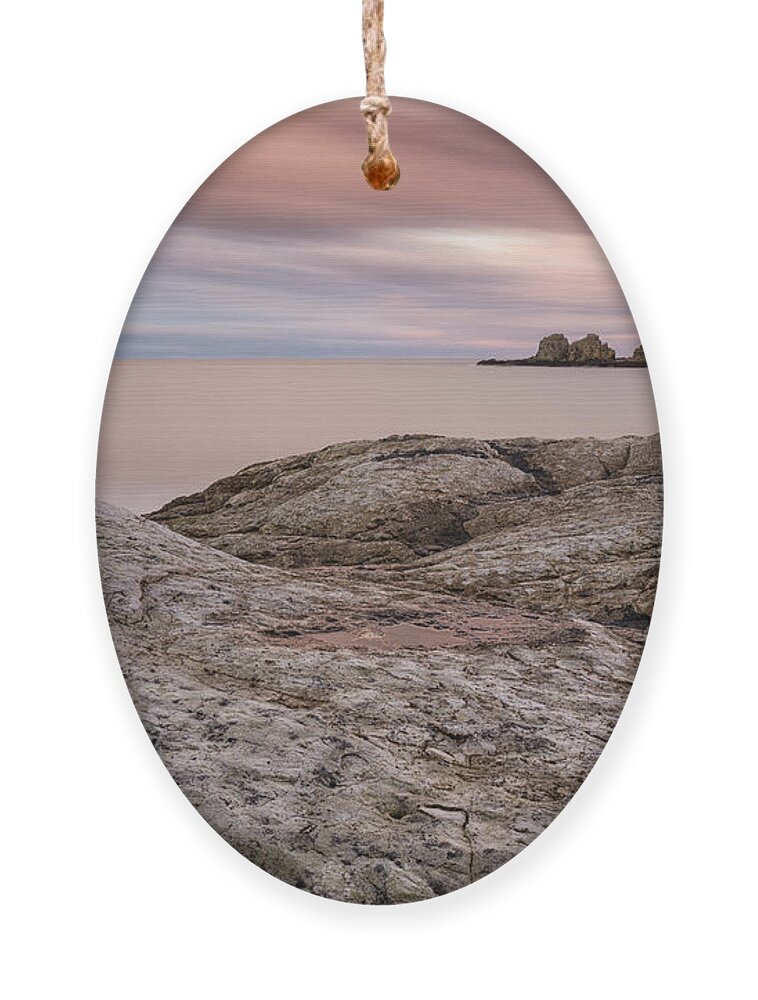 Isle Of Muck Ornament featuring the photograph Portmuck Sunset by Nigel R Bell