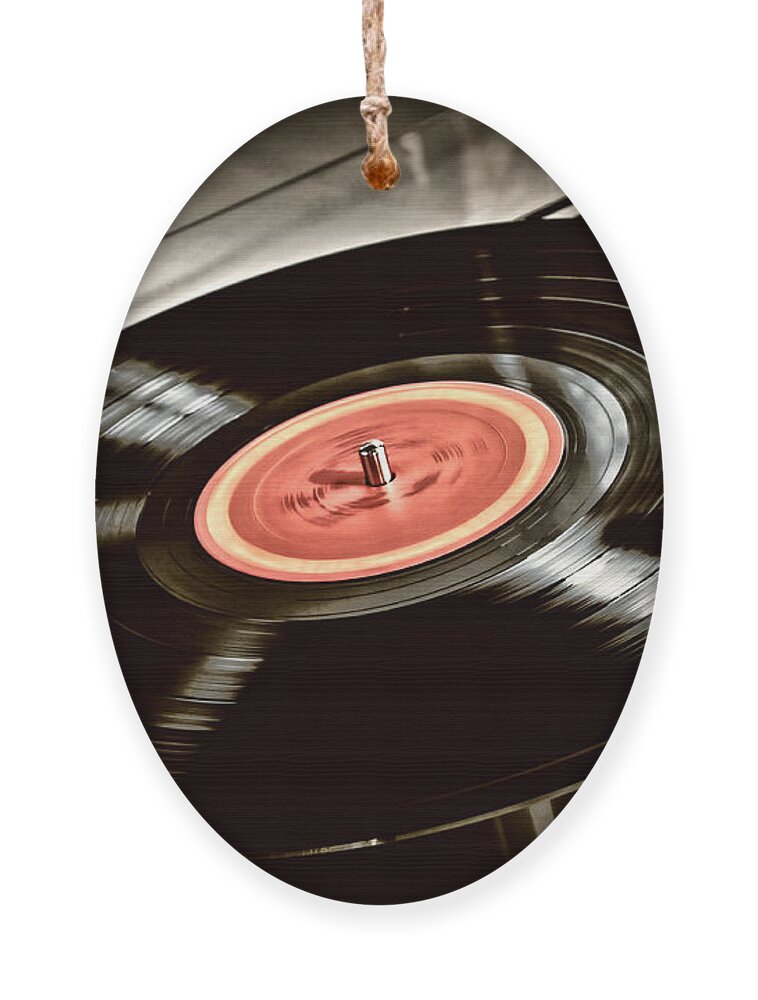 Vinyl Ornament featuring the photograph Record on turntable by Elena Elisseeva