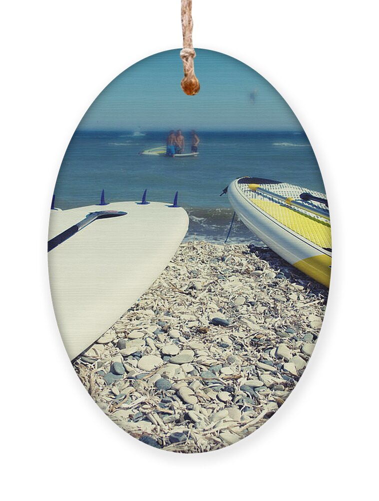 Action Ornament featuring the photograph Stand Up Paddle Boards by Stelios Kleanthous