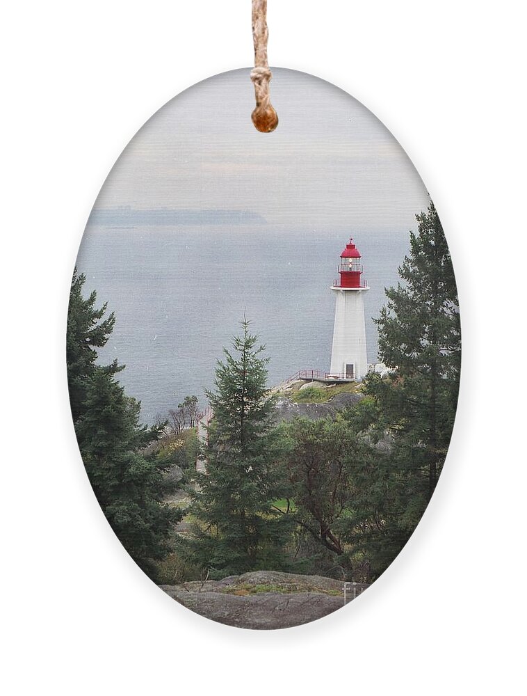 Lighthouse Ornament featuring the photograph Standing Guard by Vivian Martin