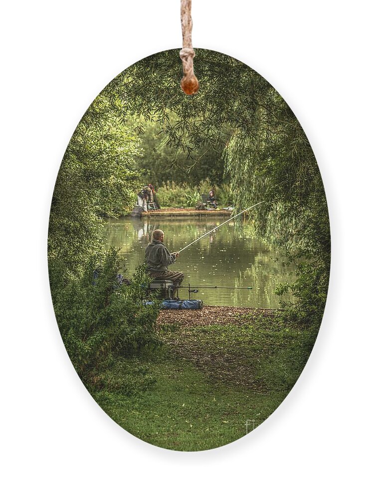 Sunday Fishing Ornament featuring the photograph Sunday fishing at the Lake by Jeremy Hayden